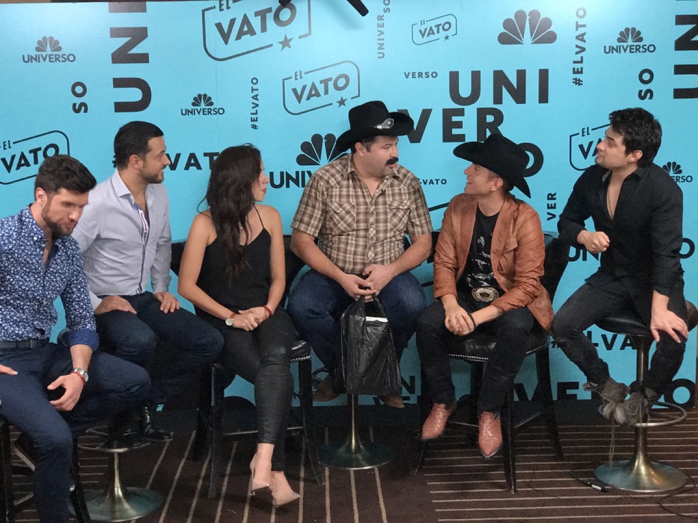 Tiburcio speaking with the El Vato cast at a Univision and NBC Universo event.
